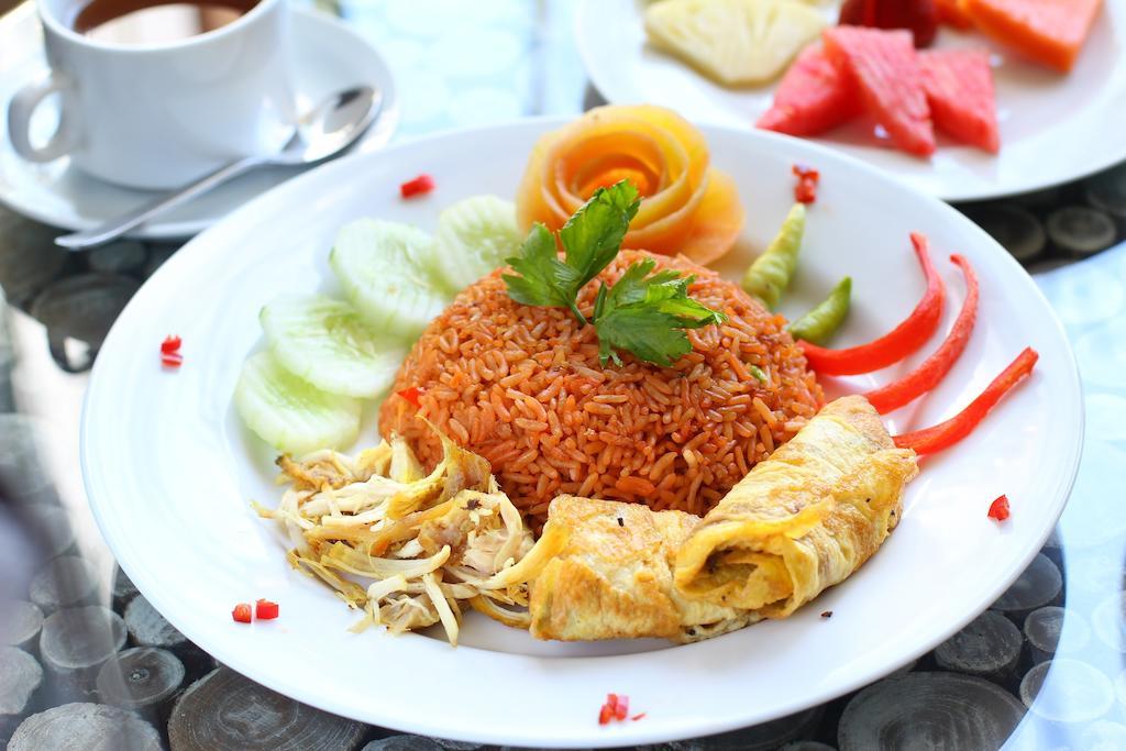 Praja Hotel Denpasa Buitenkant foto